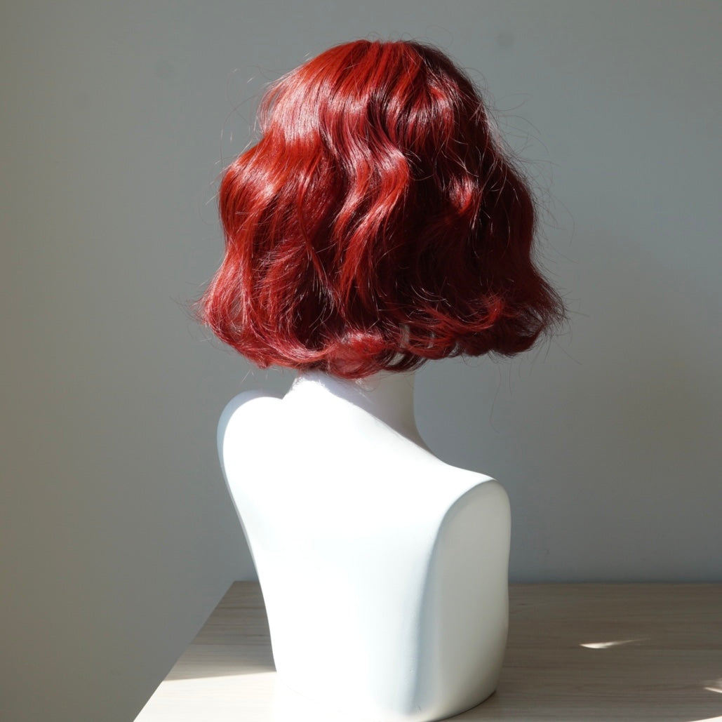 Shop the Ruby Curl Short Wavy Bob Wig with Bangs at the best price in Australia. Enjoy playful, edgy & elegant styles with Afterpay. FREE & FAST shipping on orders over AUD$70 at IVYPHANT.com.au.