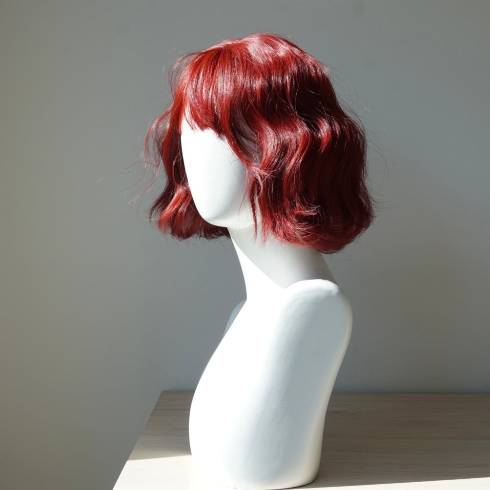 Shop the Ruby Curl Short Wavy Bob Wig with Bangs at the best price in Australia. Enjoy playful, edgy & elegant styles with Afterpay. FREE & FAST shipping on orders over AUD$70 at IVYPHANT.com.au. 