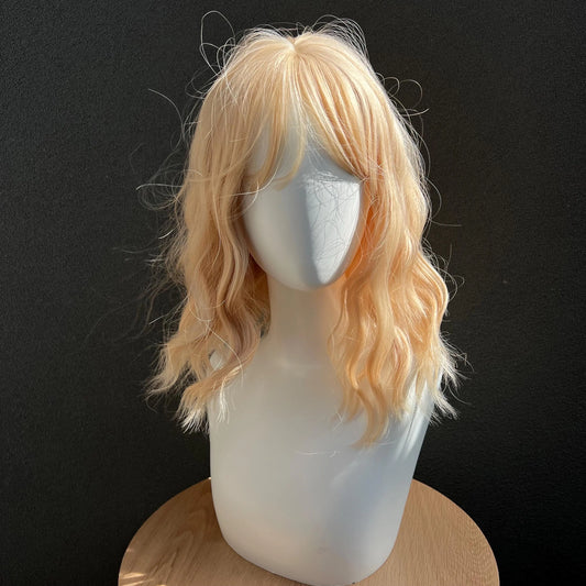 Discover the charm of our Sunset Blonde Wavy Lob Wig with Bangs, ideal for both special occasions and everyday elegance. This high-quality, heat-resistant synthetic wig offers a fresh, playful look with its soft waves and stylish bangs. Perfect for any event or just to change up your daily style!FREE & FAST shipping on orders over AUD$ 70 at IVYPHANT.com.au. 